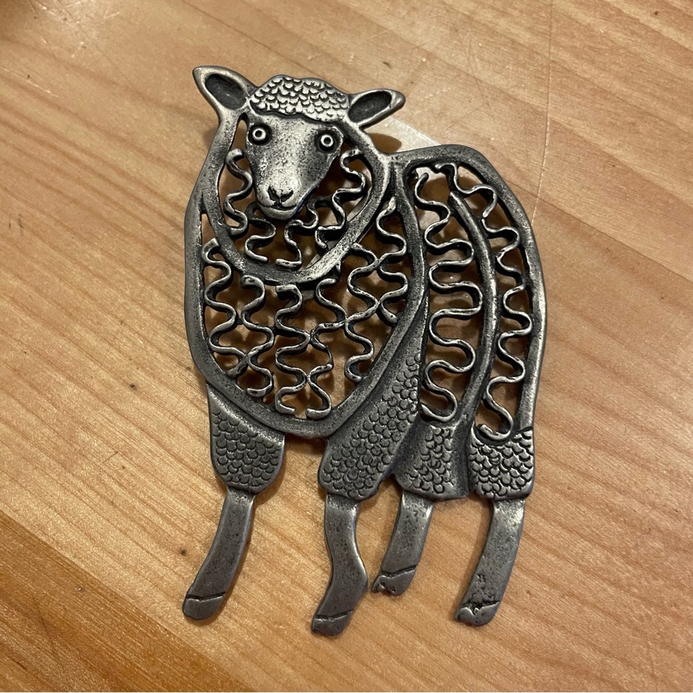 Swirly Sheep pewter Brooch perfect for your beautiful knitted or woven fabrics.